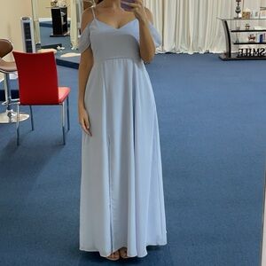 Icy blue dress. Floor length slit. Adjustable straps.